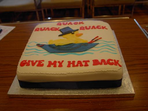 image of decorated cake with duck and book title