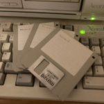 Floppy discs on a RiscPC keyboard.